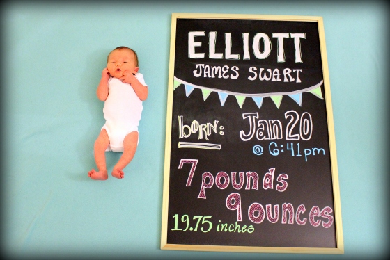 Here is my little Elliott, with his birth stats chalkboard! 
